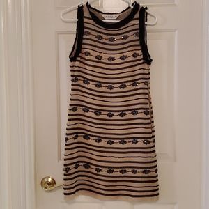 Trina Turk dress. Size 0. Tan with black borders